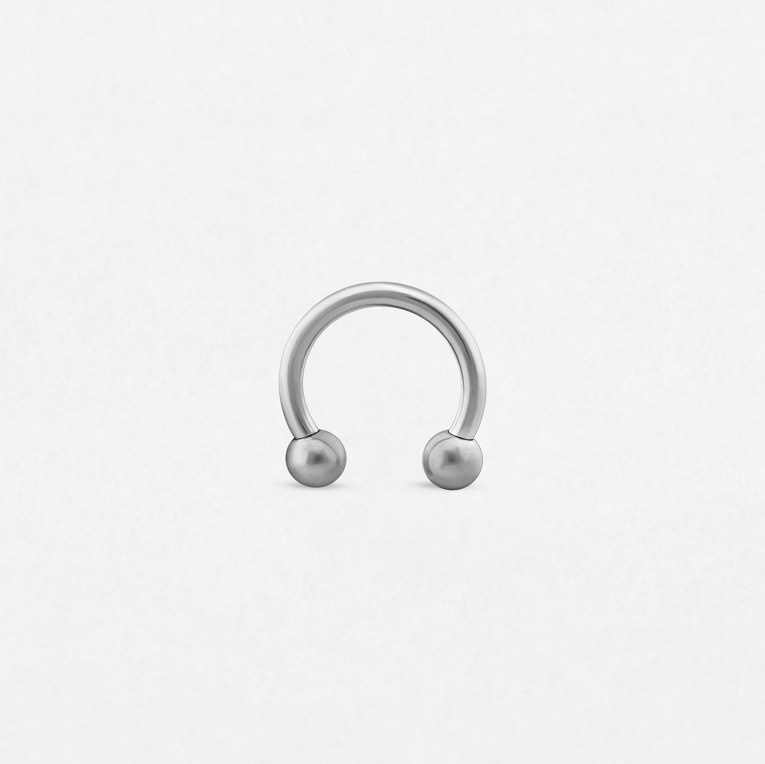 circular barbell plateado